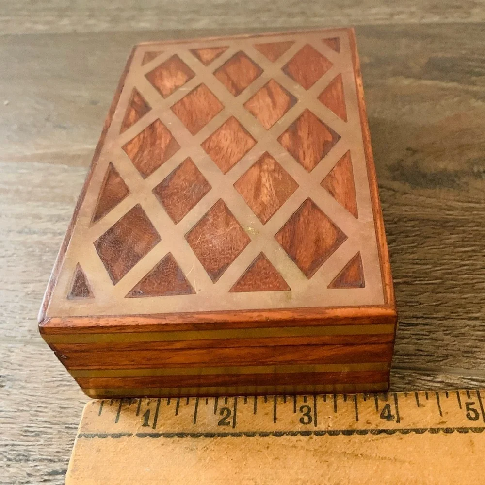 vintage wooden box with metal file